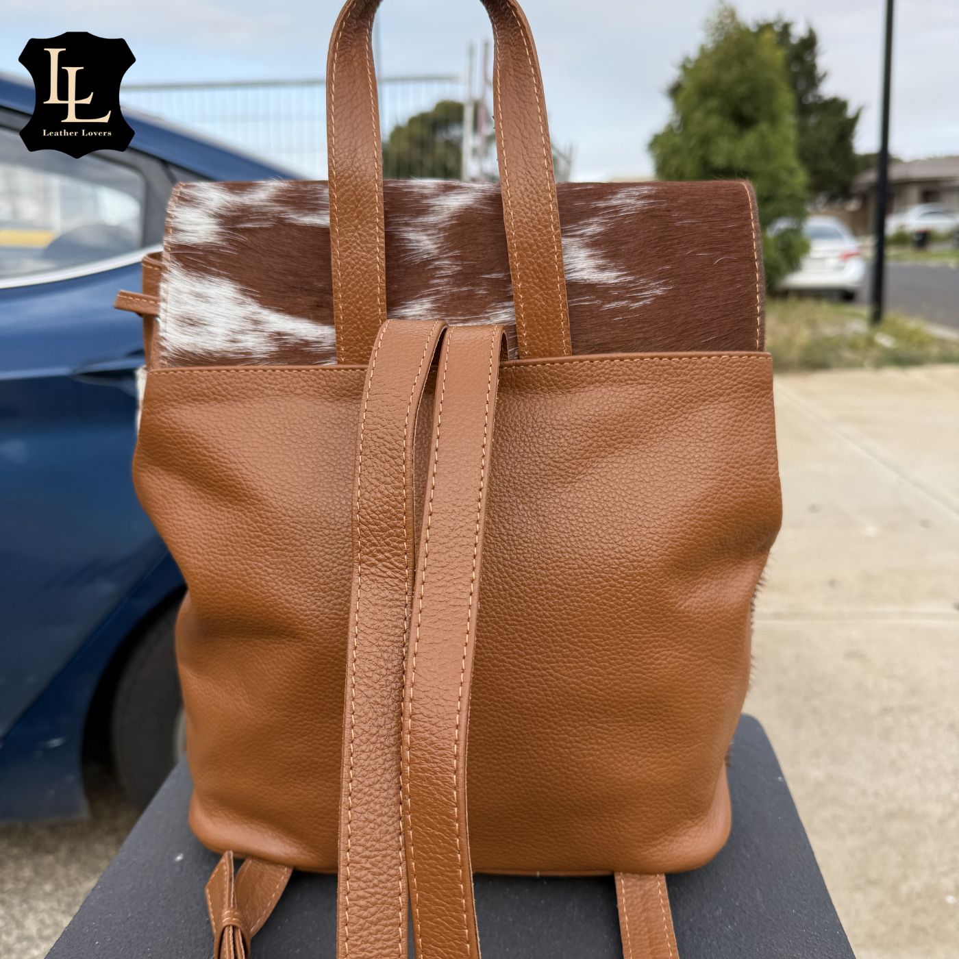 Cowhide Solid Tan Flip LV Backpack TT Leather Lovers