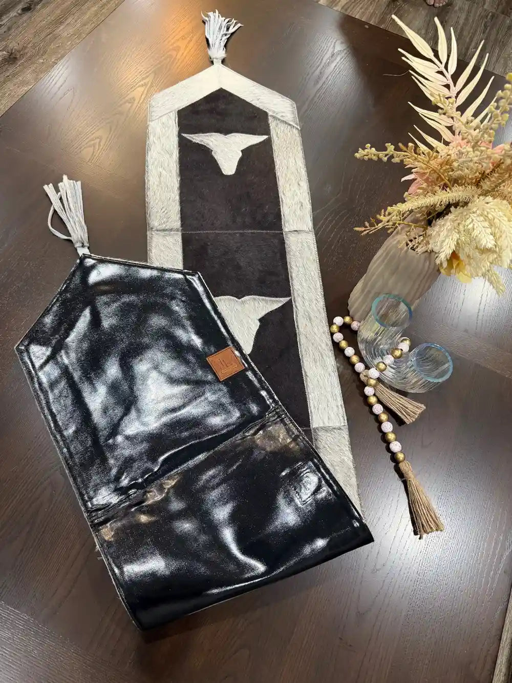 Cowhide Leather table runner with bull head leather patch, having leather fringes